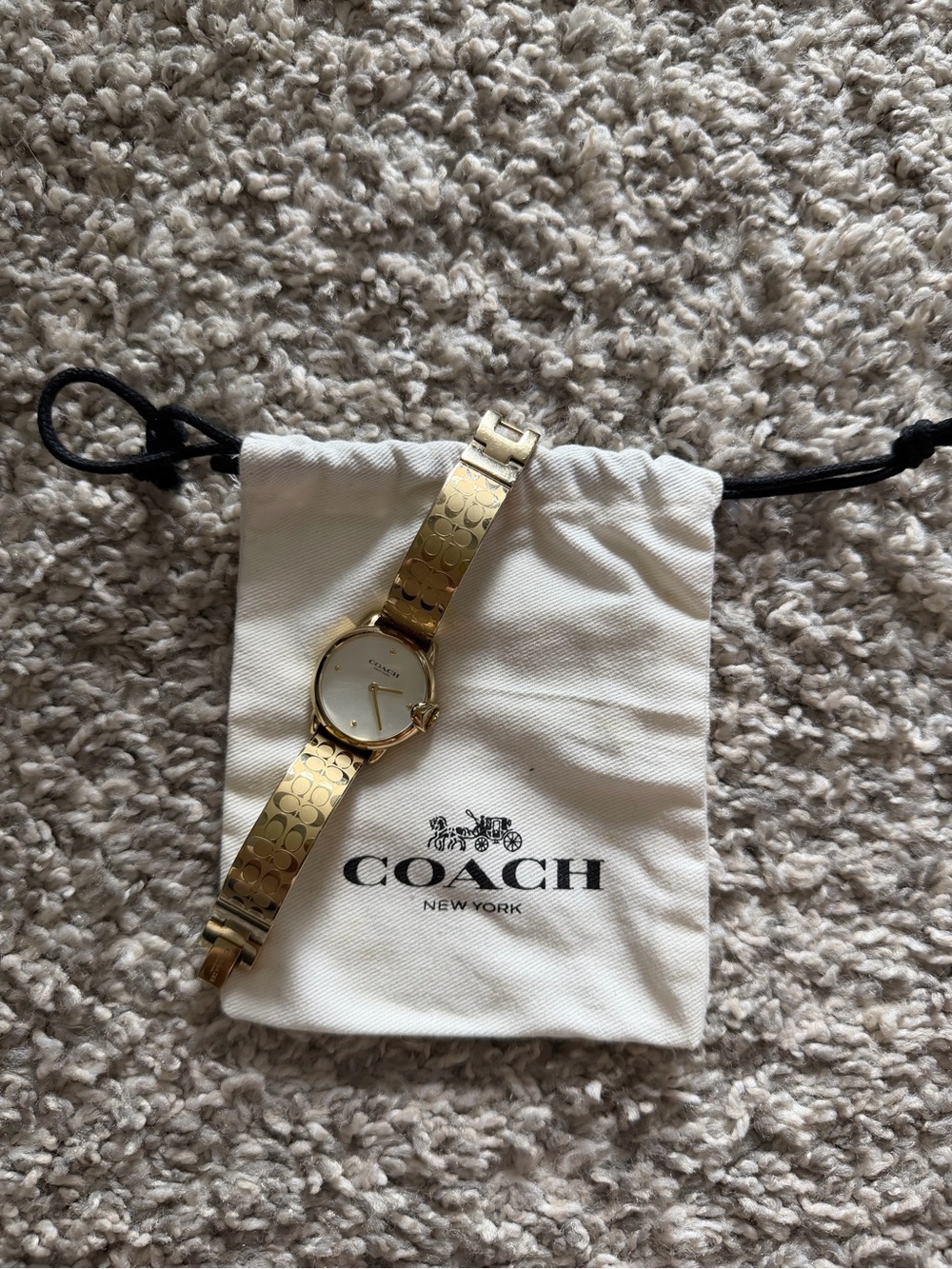 COACH Gold-Tone Signature Pattern Bangle Watch with White Dial